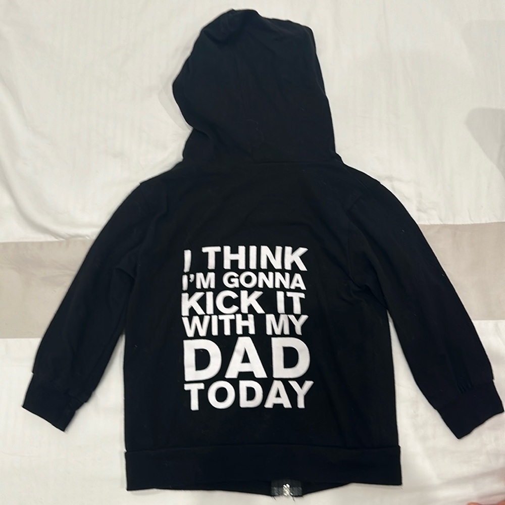 Black boy’s hoodie with a cute message in the back.